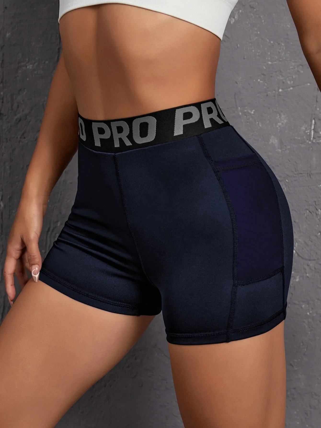 Letter Tape Waist Sports Shorts With Phone Pocket