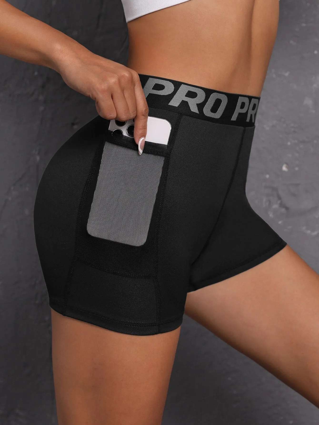 Letter Tape Waist Sports Shorts With Phone Pocket