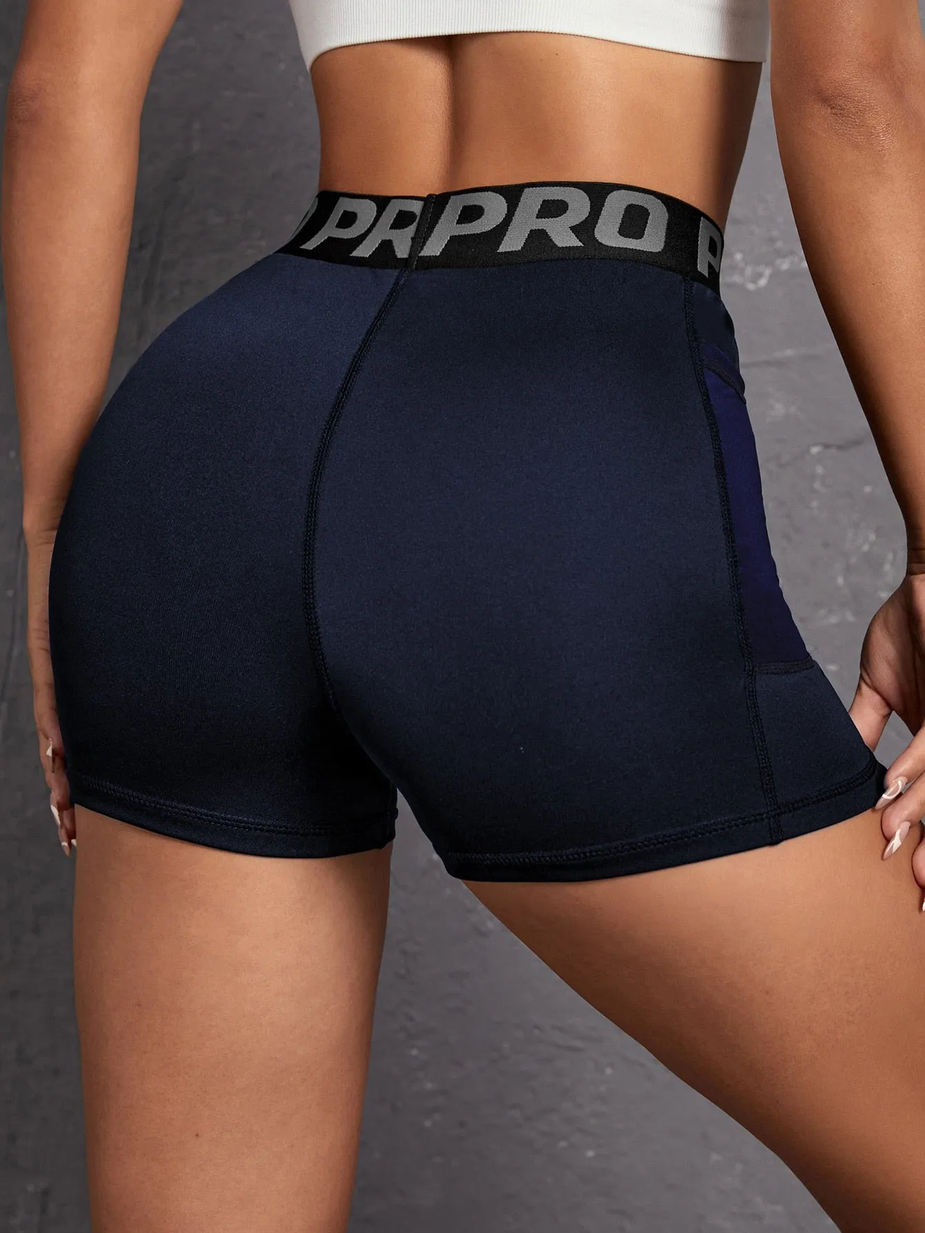 Letter Tape Waist Sports Shorts With Phone Pocket