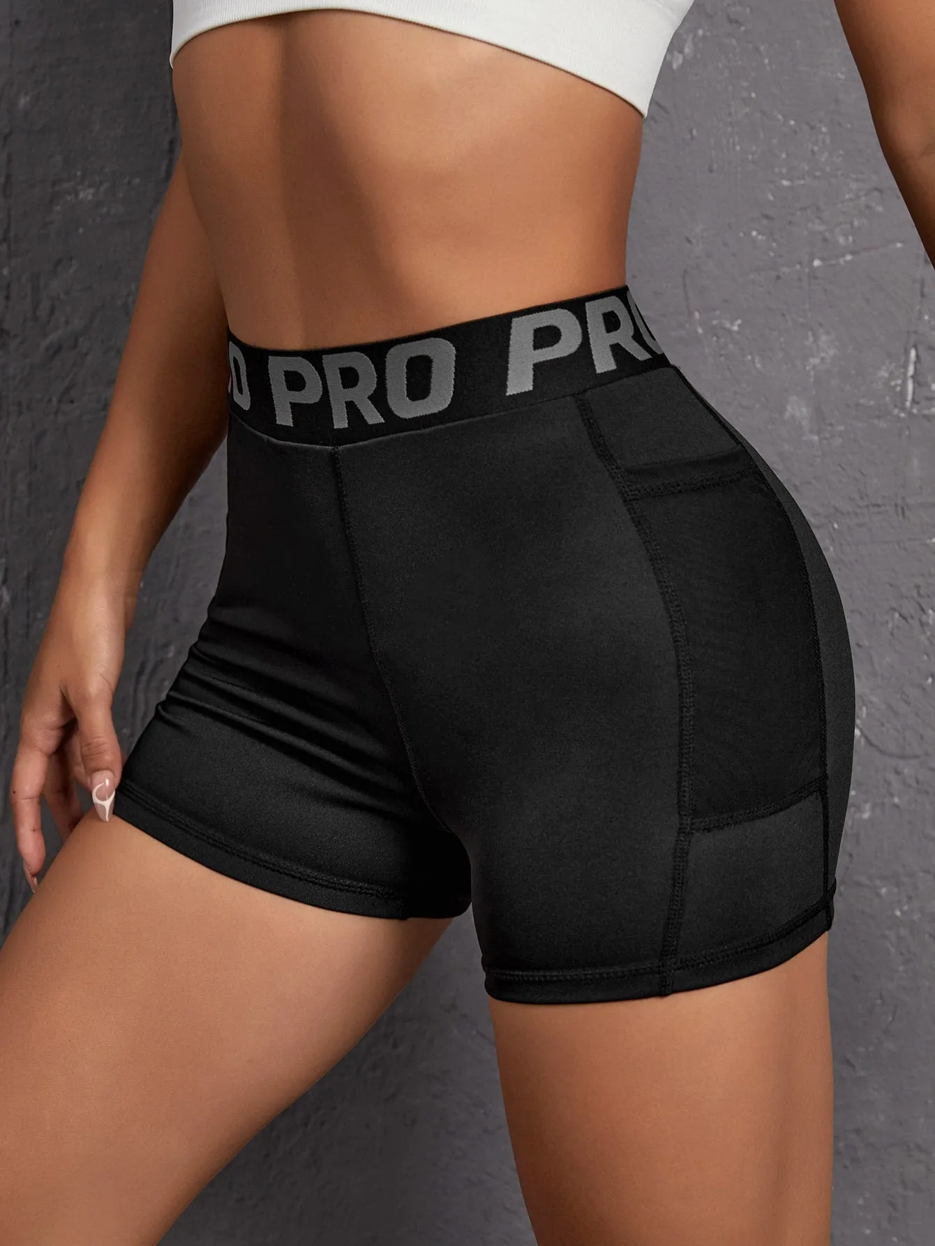 Letter Tape Waist Sports Shorts With Phone Pocket