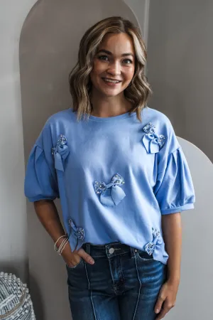Story Of Us Bow Sparkle Top • Blue