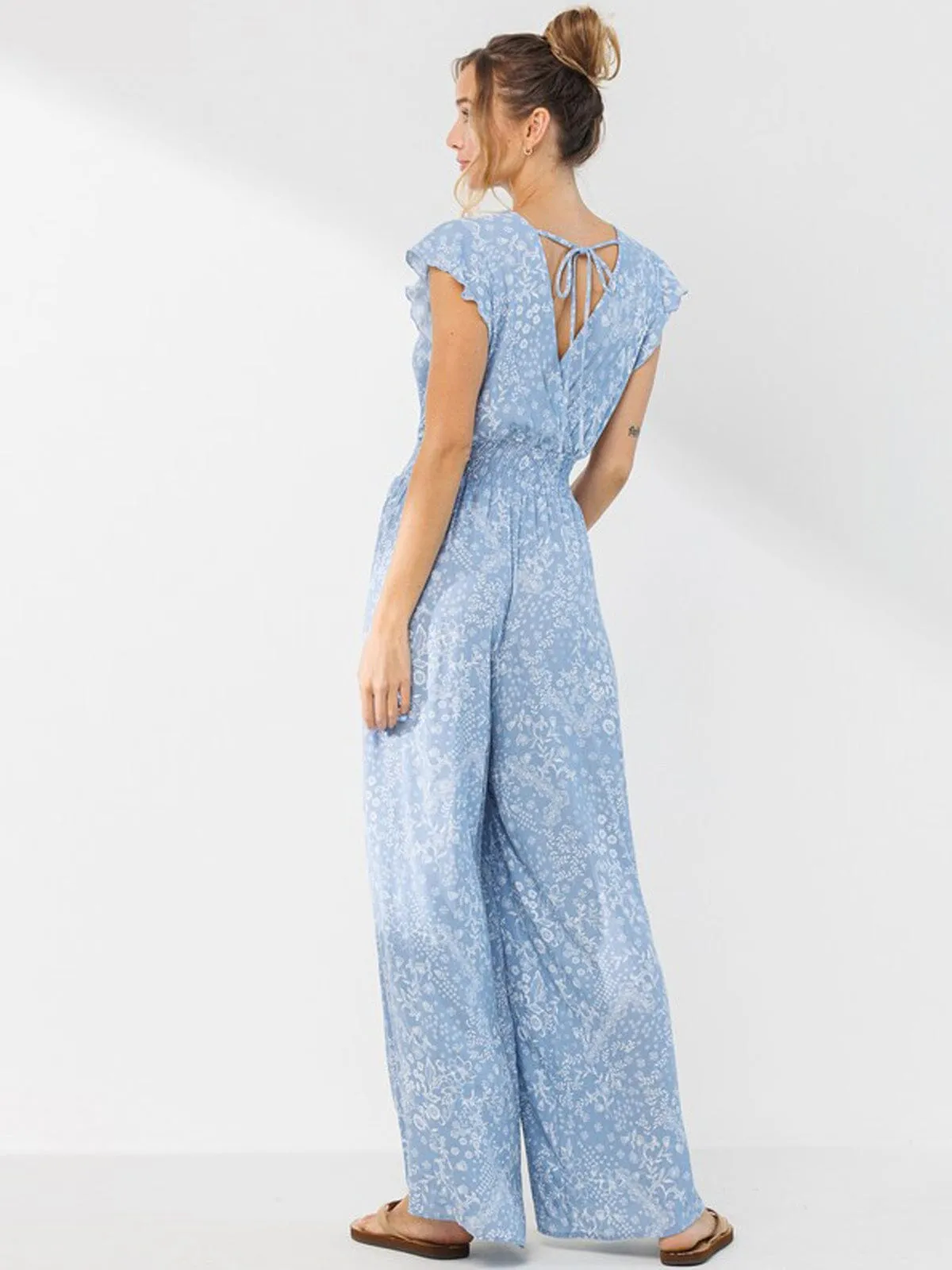 WOMEN'S SLEEVELESS V-NECK SMOCK WAIST FLORAL JUMPSUIT